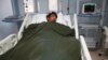 A Nepalese Sherpa Dawa Tashi, who was injured during an avalanche, gets treatment at a hospital in Katmandu, Nepal, April 18, 2014. 