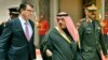 Secretary of Defense Ashton Carter walks with Kuwait's Deputy Prime Minister and Minister of Defense Sheikh Khaled Al-Jarrah Al-Sabah to attend a meeting with the Amir of Kuwait Sabah Al-Ahmad Al-Jaber Al-Sabah in Kuwait City, Kuwait, Feb. 23, 2015.