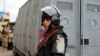 Security forces stand guard in Alexandria during the fifth anniversary of the uprising that ended the 30-year reign of Hosni Mubarak, Egypt, January 25, 2016. REUTERS/Asmaa Waguih