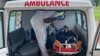 FILE - A handout photo from Medecins Sans Frontieres (Doctors Without Borders) on Oct. 25, 2020, shows a medic treating a victim of a shooting at a bilingual school in Kumba, Cameroon.