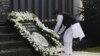 Maharashtra's Chief Minister Prithviraj Chavan places a wreath as he pays tribute at the Gymkhana police memorial marking the November 2008 Mumbai attacks, in Mumbai, Nov. 26, 2013. 