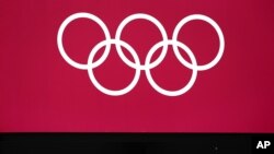 A sign displayed in the Olympic Park, July 21, 2012, in London. 