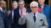 Roger Stone, an associate of President Donald Trump, leaves the U.S. District Court, after a court status conference on seven charges: one count of obstruction of official proceeding, five counts of false statements, one count of witness tampering, in Washington, March 14, 2019.