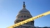 Police tape marks a secured area of the Capitol, Jan. 19, 2018, in Washington. 