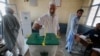 FILE - A Pakistani tribesman cast his vote during an election for provincial seats in Jamrud, a town of Khyber district, Pakistan, July 20, 2019. 