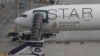 Passengers, crew arrive in Singapore hours after turbulence-stricken flight 