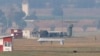 An unmanned aerial vehicle maneuvers on the runway after it landed at the Incirlik Air Base, on the outskirts of the city of Adana, southern Turkey, July 30, 2015. 