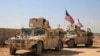 U.S. forces take up positions on the outskirts of the Syrian town, Manbij, a flashpoint between Turkish troops and allied Syrian fighters and U.S.-backed Kurdish fighters, March 7, 2017.