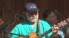 Wayne Henderson performs at the recent music festival in Virginia.