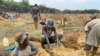 Rescue workers install a pump to drain water from a collapsed mineshaft at Ran Mine, in Bindura, Zimbabwe, Nov. 26, 2020.