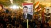 Members of the Muslim Brotherhood and supporters of deposed Egyptian President Mohamed Morsi shout slogans and hold up posters during a rally marching back towards Rabaa al-Adawiya Square where they are camping, in Cairo, August 2, 2013.