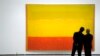 Visitors observe "Untitled", a 1952-3 painting by U.S. artist Mark Rothko during the opening of "Pictorial Abstraction. European and American Art Tendencies 1949-1969" at the Guggenheim Museum in Bilbao June 14, 2011. The exhibition, featuring eighty work