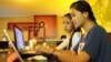រូបឯកសារ៖ និស្សិត​សាកលវិទ្យាល័យ​ភូមិន្ទ​ភ្នំពេញ​បើក​មើល​អ៊ីនធឺណិត​នៅ​ហាង​កាហ្វេ​មួយ​តាម​បណ្តោយ​មហាវិថី​សហព័ន្ធ​រុស្ស៊ី​កាល​ពី​ថ្ងៃ​ទី​១៣ ខែ​មិថុនា ឆ្នាំ​២០១៤។
