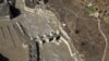 An aerial view shows a damaged barrage after a flash flood swept a mountain valley destroying dams and bridges, in Tapovan in the northern state of Uttarakhand, India, Feb. 12, 2021. 