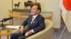 Japan's Chief Cabinet Secretary Yoshihide Suga speaks to VOA, Tokyo, Japan, February 4, 2013. 