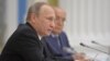 Russian President Vladimir Putin speaks during a meeting of the Lomonosov Moscow State University Supervisory Board at the Kremlin in Moscow, Russia, May 28, 2015.