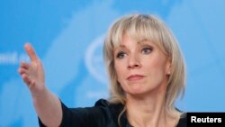 FILE - Russia's Foreign Ministry spokeswoman Maria Zakharova reacts during the annual news conference of the Russia's Foreign Minister Sergei Lavrov (not pictured) in Moscow, Jan. 16, 2019. 