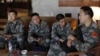 U.N. observers from China at at hotel in Damascus before heading to areas where protests against Syrian President Bashar al-Assad have been taking place, May 18, 2012.