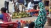 Sellers at Abuja's Utako market say they charge more for products during Ramadan because farmers charge more, Nigeria, July 2013 (Heather Murdock for VOA).