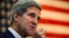 FILE - U.S. Secretary of State John Kerry gestures while speaking to U.S. Embassy staff during a break in an extended meeting with Afghan President Hamid Karzai in Kabul.