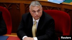 FILE PHOTO: Hungarian PM Orban takes the oath of office in the Parliament in Budapest