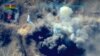 In this photo taken from video released by the Azerbaijan's Defense Ministry, Oct. 1, 2020, an unmanned aerial vehicle flies over a site during fighting in the self-proclaimed Republic of Nagorno-Karabakh, Azerbaijan.