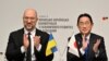 Ukraine's Prime Minister Denys Shmyhal, left, and Japanese Prime Minister Fumio Kishida attend a memorandum of cooperation exchange ceremony during the Japan-Ukraine Conference for Promotion of Economic Growth and Reconstruction at Keidanren Kaikan in Tokyo on Feb. 19, 2024.
