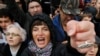 A woman shouts during a rally to support political prisoners in Moscow, Russia, Sunday, Sept. 29, 2019.