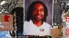 FILE - A memorial including a photo of Philando Castile adorns the gate to the governor's residence, July 25, 2016, where protesters demonstrated in St. Paul, Minn., against the July 6 shooting death of Castile by police officer Jeronimo Yanez. 