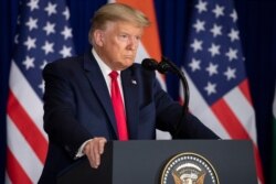 U.S. President Donald Trump pauses while speaking during a news conference, Feb. 25, 2020, in New Delhi, India.