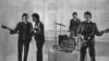 FILE - The Beatles, from left: Paul McCartney, George Harrison, Ringo Starr and John Lennon, perform on stage, undated.