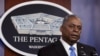 FILE - U.S. Defense Secretary Lloyd Austin speaks to Defense Department personnel at the Pentagon in Arlington, Virginia, Feb. 10, 2021..