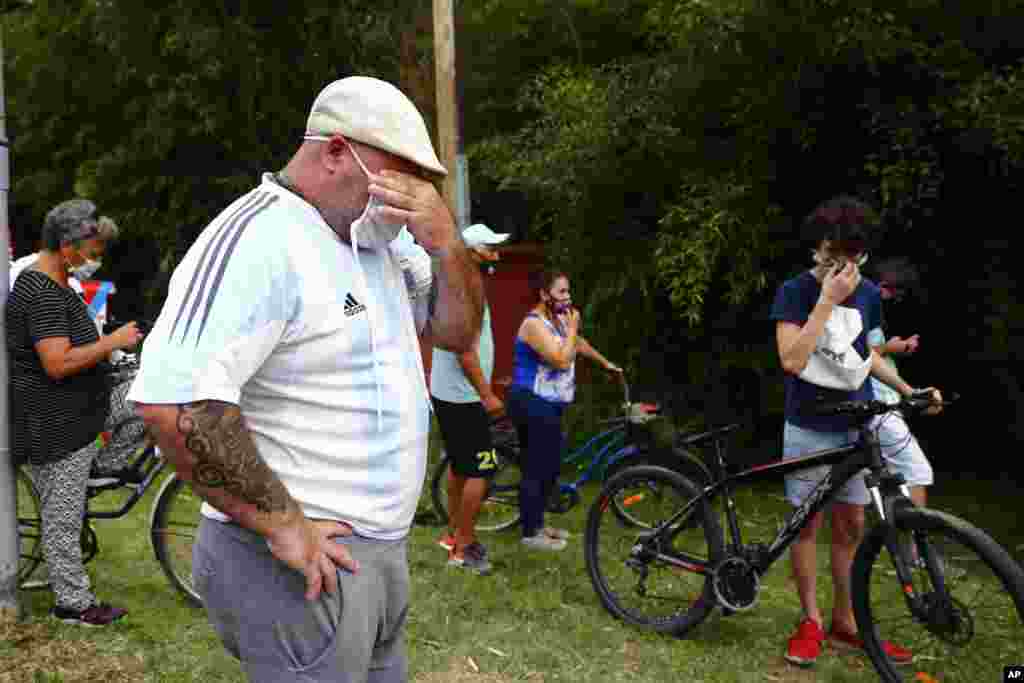 Mourners gather outside the home of Diego Maradona, in Buenos Aires, Argentina.&nbsp;The Argentine soccer great who was among the best players ever and who led his country to the 1986 World Cup title, died from a heart attack at his home in. He was 60.&nbsp;
