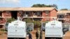 FILE - Police patrol during a 21-day nationwide lockdown called to help curb the spread of coronavirus disease, in Harare, Zimbabwe, April 3, 2020. 