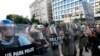 FILE - Police clear the area around Lafayette Park and the White House as demonstrators gather to protest the death of George Floyd, June 1, 2020, in Washington. Floyd died after being restrained by Minneapolis police officers.