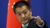 FILE - Chinese Foreign Ministry spokesman Lu Kang at a news conference in Beijing, Oct. 27, 2015. 