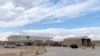 FILE - Buildings are seen during a press tour inside Al Asad military airbase in the western Iraqi province of Anbar, Jan. 13, 2020.