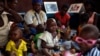 FILE - Children recovering from malnutrition play at the Children hospital in Bangui, Central African Republic.