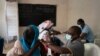 A health worker administers a dose of Janssen Johnson & Johnson COVID-19 vaccine at Dakar's Medina neighborhood, Senegal, July 28, 2021. 