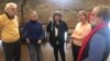 Members of the Kittamaqundi Community Church led the effort to help a refugee family of six to resettle in Columbia, Md. (A.Barros/VOA)