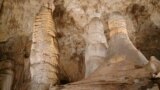 A highly decorated area can be illuminated using the lanterns on the guided tour of Carlsbad Cavern.
