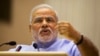 Indian Prime Minister Narendra Modi speaks at the launch of a campaign aimed at opening millions of accounts for poor Indians in New Delhi, Aug. 28, 2014.