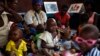 FILE - Children recovering from malnutrition play at the Children hospital in Bangui, Central African Republic.