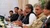 FILE - Pakistani Prime Minister Shahid Khan Abbasi, (3rd-R) speaks during his meeting with U.S.Secretary of State Rex Tillerson meeting at the Prime Minister's residence, Oct. 24, 2017, in Islamabad, Pakistan.