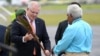 Australian Prime Minister Scott Morrison is presented with a gift as he arrives in Port Vila, Vanuatu, Jan. 16, 2019.
