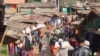 FILE - In this image from a video, Rohingya refugees walk at the Balukhali refugee camp in Cox's Bazar, Bangladesh, Feb. 2, 2021. Tens of thousands of Rohingya are believed to be trapped in fighting in western Myanmar as the Arakan Army battles the junta.