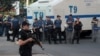 FILE - Turkish riot police stand guard in front of a local branch of the pro-Kurdish Peoples' Democratic Party (HDP) in Diyarbakir, Turkey, July 8, 2019. 