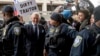 Former campaign adviser for President Donald Trump, Roger Stone arrives at Federal Court, Jan. 29, 2019, in Washington. 