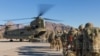 FILE - U.S. soldiers load onto a Chinook helicopter to head out on a mission in Afghanistan, Jan. 15, 2019. (U.S. Army handout via Reuters)