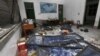 A damaged room in a residential building is seen after several locations were targeted with parcel bombs in the southwestern city of Liucheng, Guangxi province, Sept. 30, 2015.